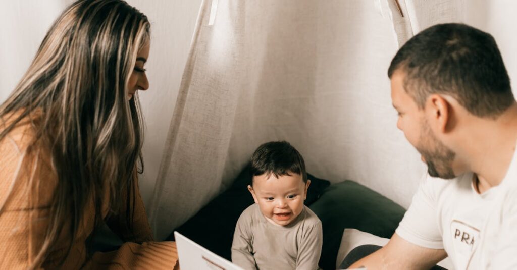 A family enjoys quality time reading with their baby in a cozy indoor tent.