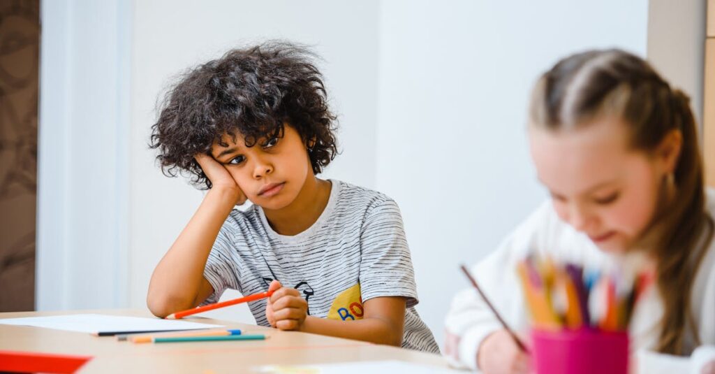 Children engaged in classroom activities with focus on learning and creativity.